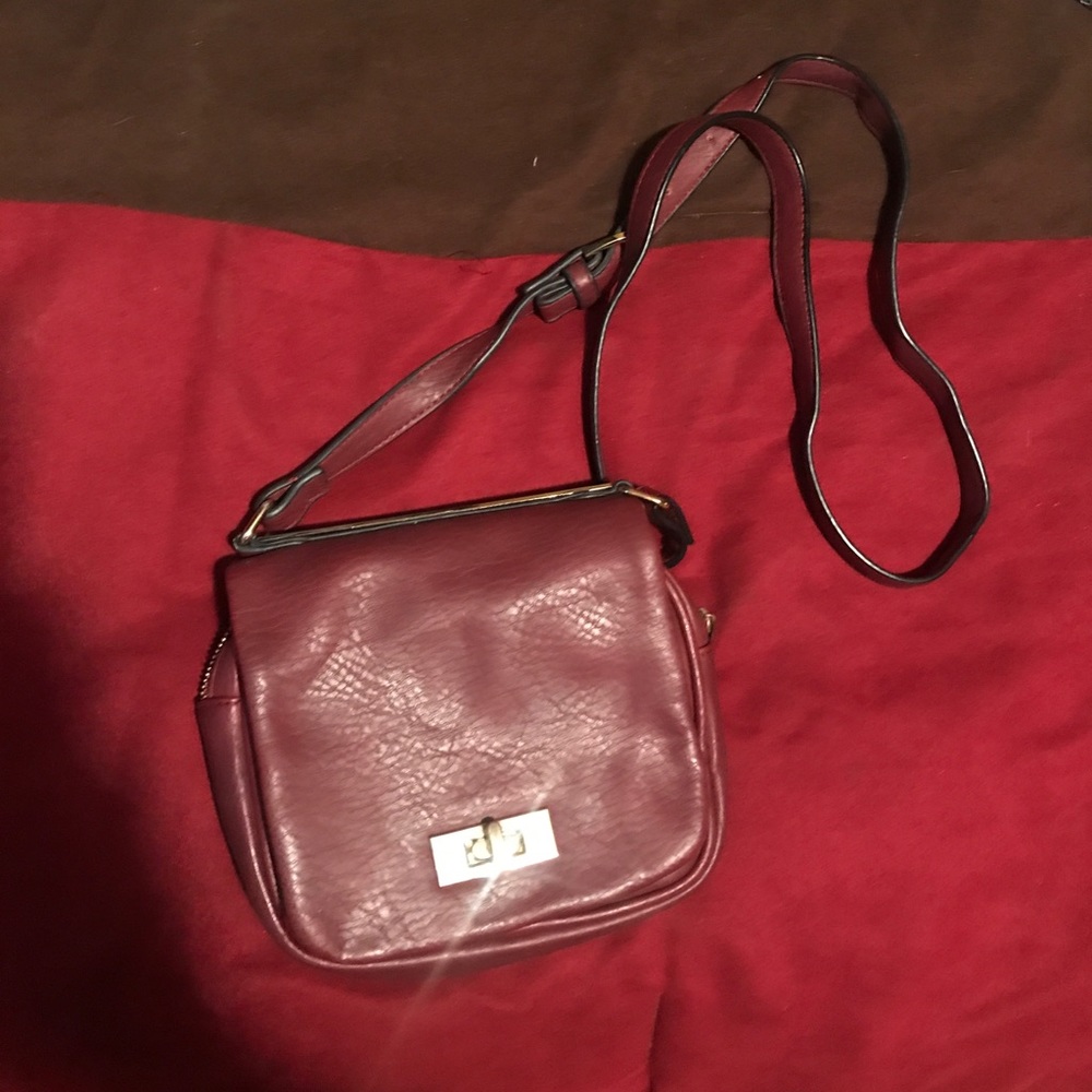 Charming Charlie’s maroon cross body